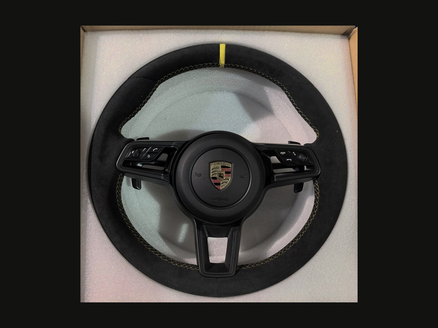 Porsche steering wheel upgrade in Alcantara with contrast stitching